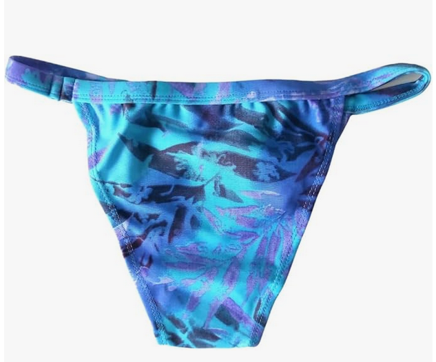 Bikini brasileño azul NORDESTINA, estampado vibrante, top con tirantes ajustables y cuello en V. Hecho con 85% poliamida y 15% elastano, perfecto para la playa y piscina.
